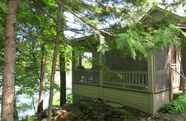 Nestled In The Pine Trees, On The Shore Of Lake Champlain