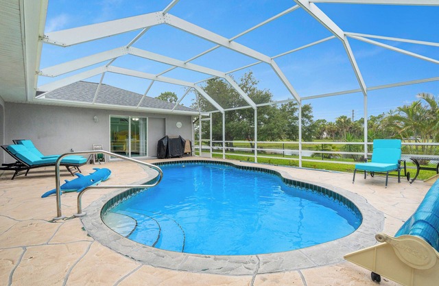 Newly Remodeled 4BR/3BR Canal Front Retreat w/Pool Near Golf Course & Beach FL