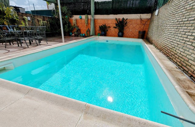 Next to the Metro and the center of Seville! Large house with private pool.