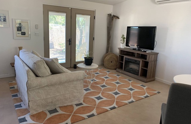 NO HOST/CLEANING FEES for this East Side Studio! Private yard and shared pool!