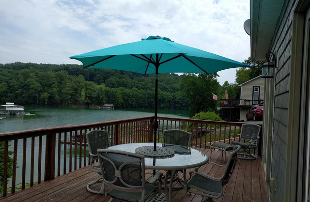 Norris lakefront home with covered boat dock