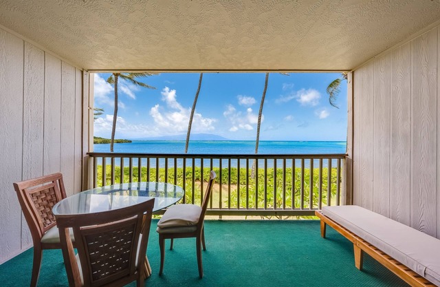 Oceanfront getaway with an outdoor pool, tennis courts, & beach view