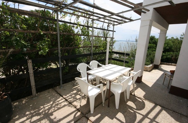 One bedroom apartment with terrace and sea view Cove Smokvica, Pag (A-6314-a)