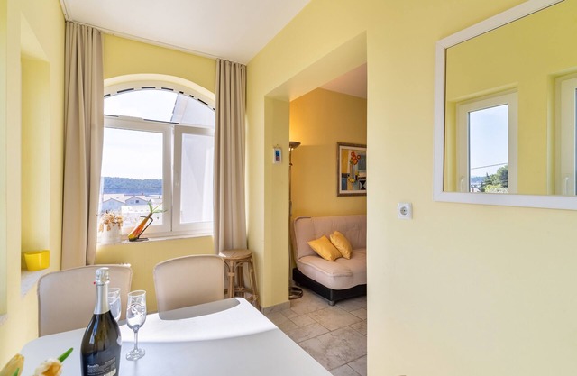 One bedroom apartment with terrace and sea view Barbat, Rab (A-3203-a)