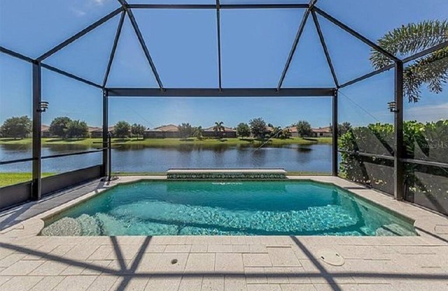 Outstanding Lake View and your own pool, 2 bedroom,2 bath plus den
