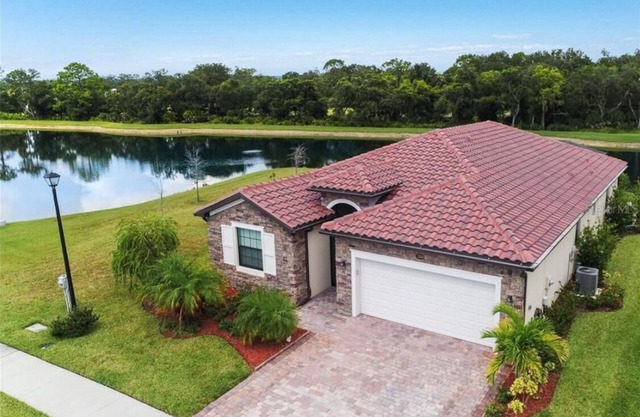 PARADISE MEETS PRIVACY WITH AMAZING WATER VIEW & HEATED POOL