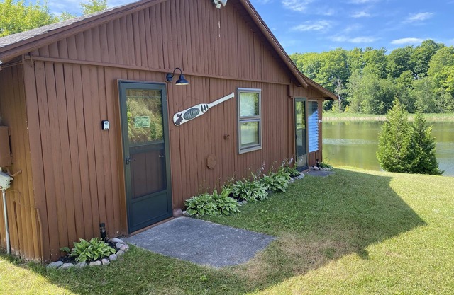 Peaceful cabin with Black River frontage in Northern Michigan!