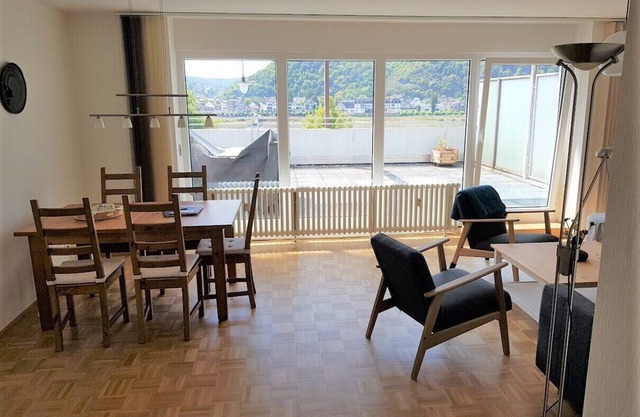 Penthouse directly on the Rhine with a 100m2 roof terrace near the Eifel & Westerwald