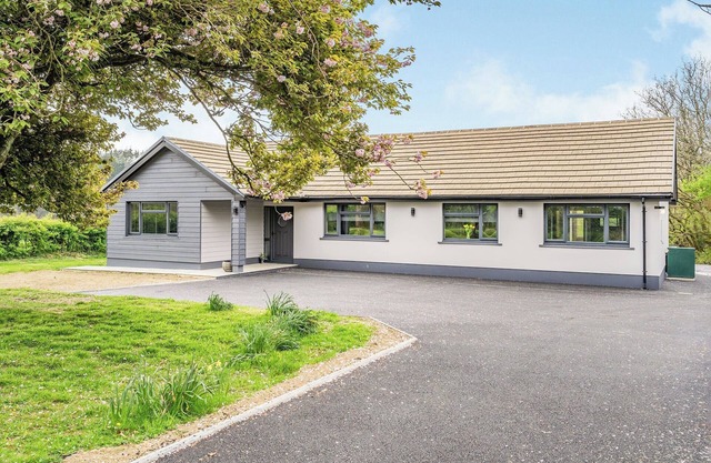 Picked for its tranquil location, private hot tub and views over the meadows.