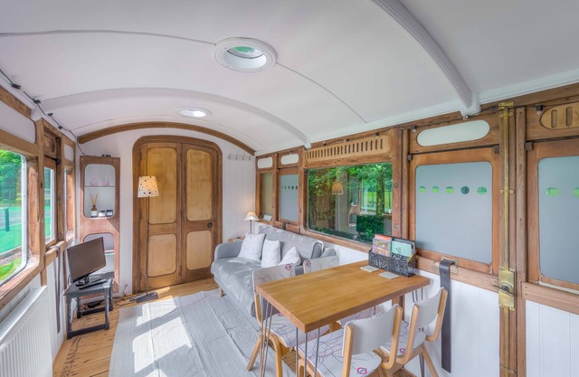 Railway carriage accommodation with tennis court!