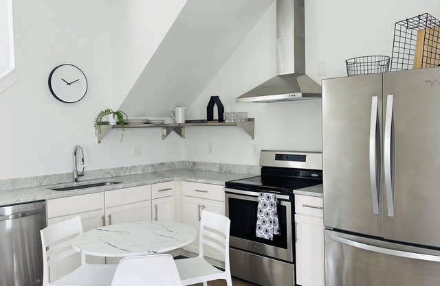 RARE FIND - 1 Bed 2 Bath Modern Private Oversized Garage City Skyline Views