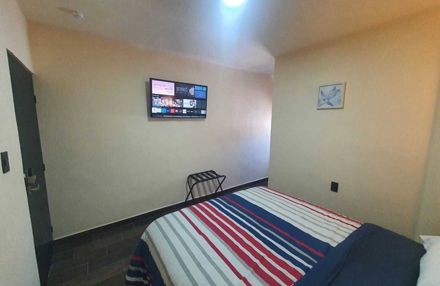 Refugio Acolchado: Habitaciones Dobles para Humanos y Peludos Compañeros