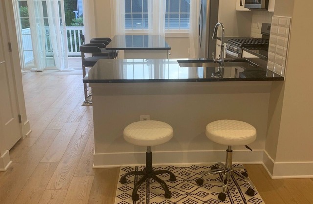 Relax in an upscale modern new town house. 10 minutes from Dulles Int'l Airport.