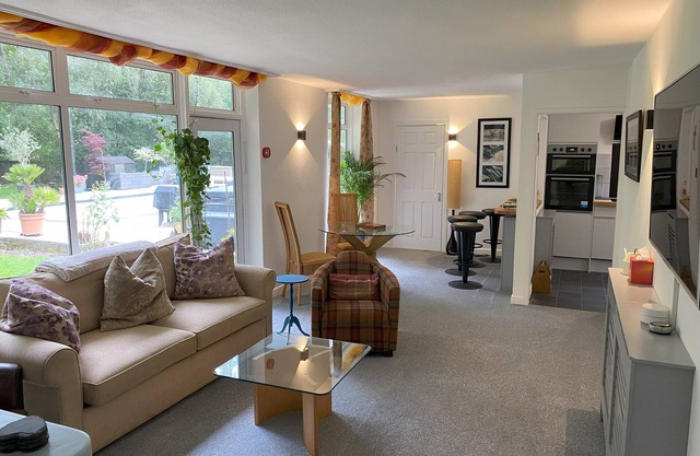 Relax surrounded by woodland in the Annex at Capers End!