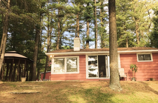 Relaxing Waterfront Cabin Located On A Sandy Bottom Crystal Clear Lake.