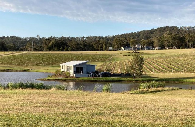 Romantic lakehouse set in a private vineyard in the Hunter Valley
