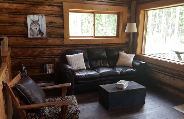 Rustic cabin hidden among the pines.