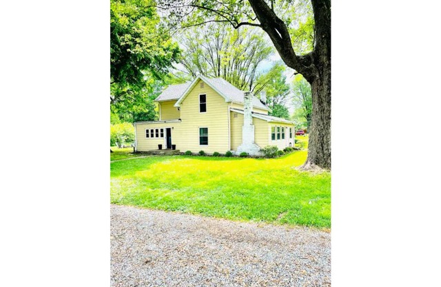 Rustic Farmhouse with Spacious Wooded Lot
