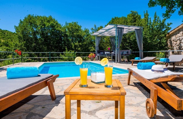 Rustic three-room Villa Ognjistar with a beautiful garden and luxury private pool surrounded by peace and nature near the Makarska Riviera