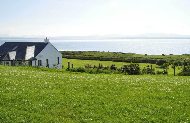 Sea front family home, large garden, close to Port Charlotte, sleeps up to 8.