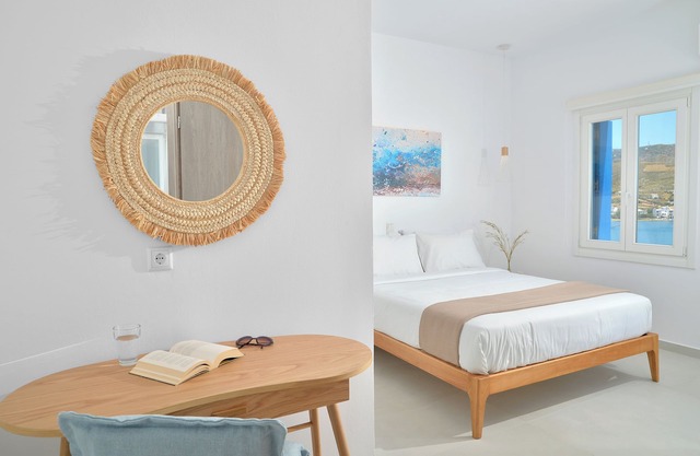 Sea-side Villa Hydroussa by Andros Homes, ideal for a relaxing retreat.