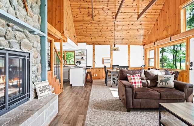 Secluded 4-season cabin w/private waterfront, epic game room & mins from trails