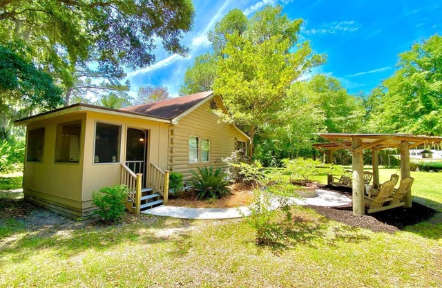 Secluded, peaceful Coastal Log Cabin with hot tub.