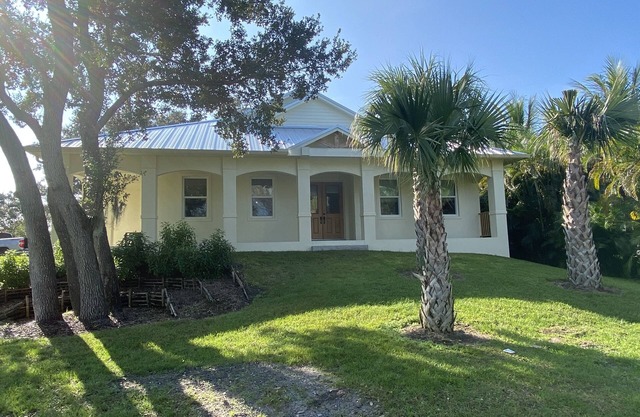 Serene coastal beauty located 1 block off the Indian River.