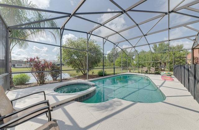 South facing pool & spa on water conservation area in gated community