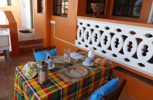 Southern Comfort at its best! Family suite overlooking quaint village street.