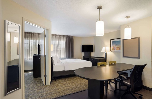 Spacious 1BR Suite | 2 Queens & Kitchen | Parking Included