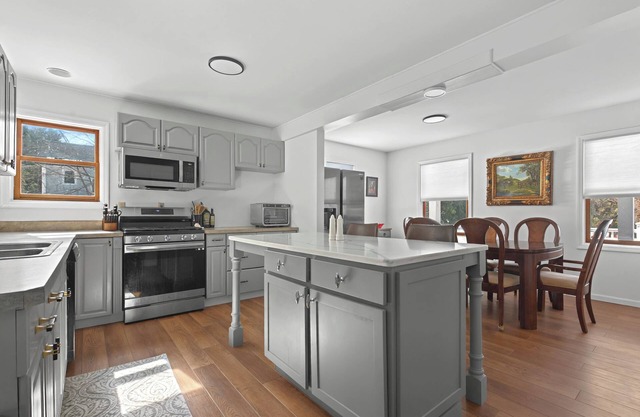 Spacious 5-bedroom house with in ground pool, pool house. 2 full kitchens.