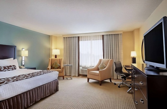 Stay in a Contemporary Pet Friendly Hotel Near Delta Flight Museum! Outdoor Pool