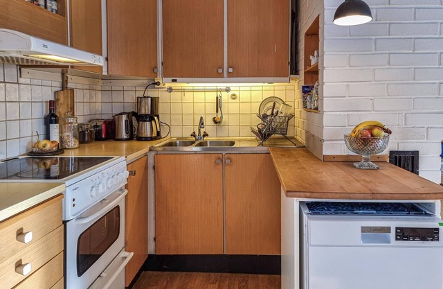 Step into a decorative cottage with a rustic flair.