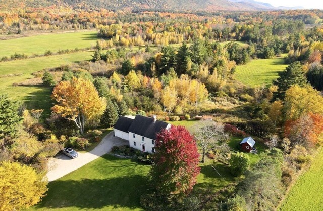 Sun-filled, quiet country home on 27 acres with mountain views