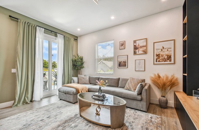 Sun Soaked Designer Condo with Patio