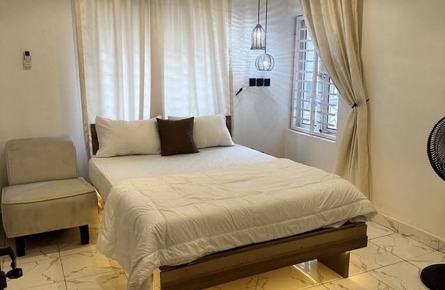 Sunflower themed room in very serene and secure environment in the city center.
