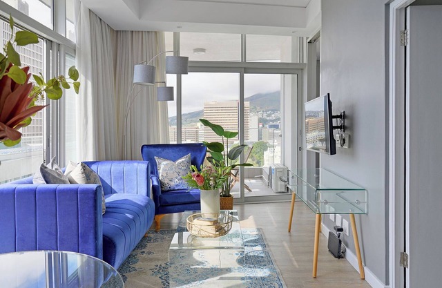Sunny Corner Apartment with 180° Ocean, City & Mountain Views