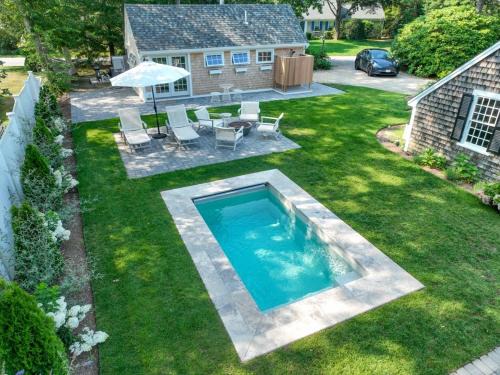 Swing Set Plunge pool and large yard await