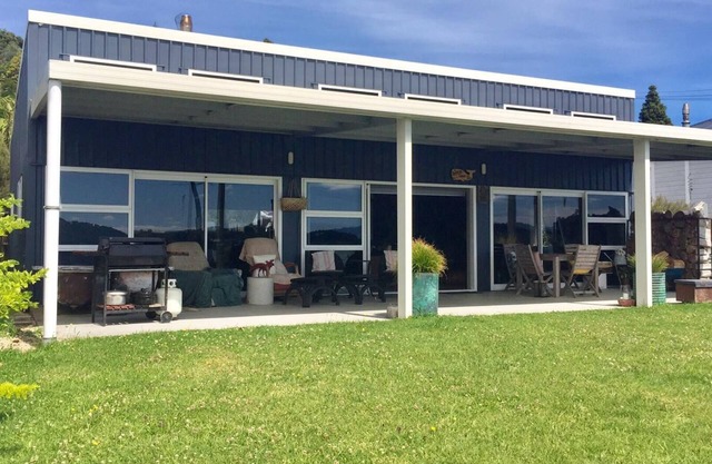 Te Waitere Village spectacular water views of harbour and surrounding hillsides.