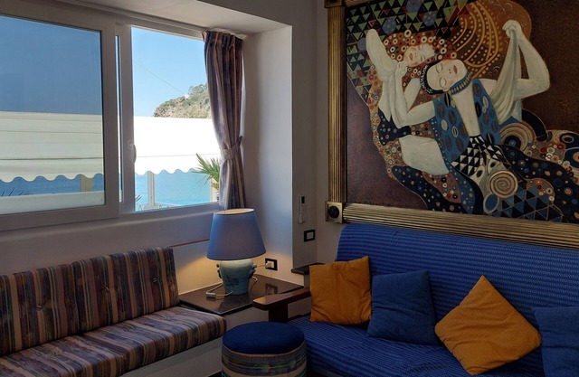 THE MERIDIANA APARTMENT ON THE SEA WITH PRIVATE BEACH SDRAIO AND UMBRELLA