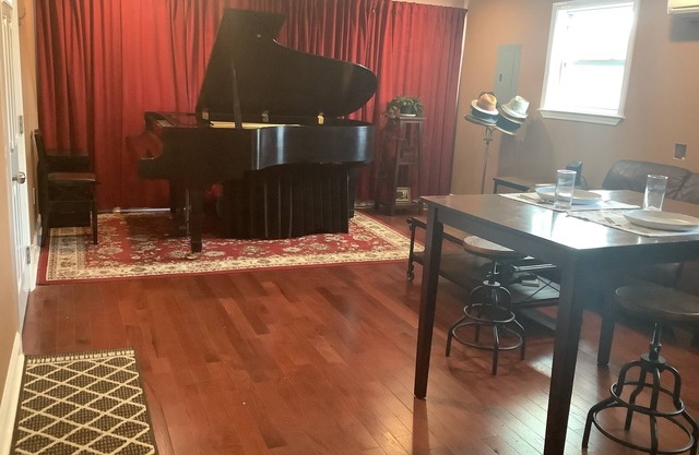 The New Orleans residence of a jazz pianist.