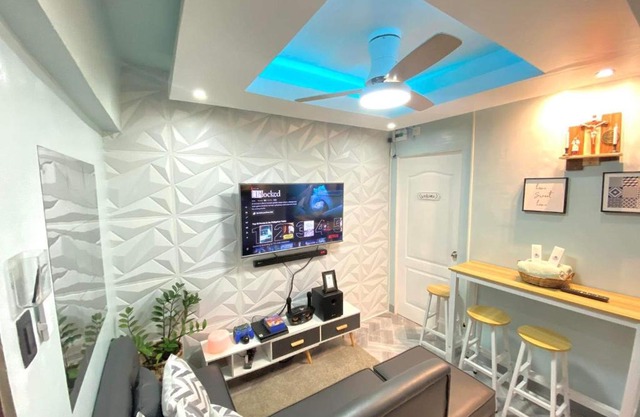 The PAD Staycation 2BR Condo with PS4, Netflix, WIFI