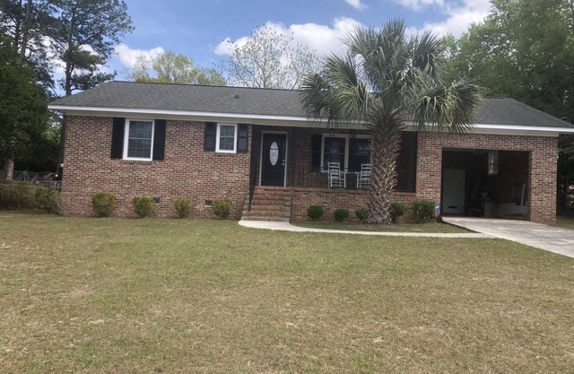 Trendy, cozy and casual 2 bedroom brick with garage