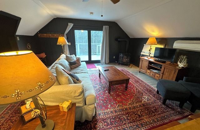 Trout River Suite - Amazing 1BR suite with deck overlooking the Trout River & only 7 minutes to Jay Peak Resort. With Breakfast Included!