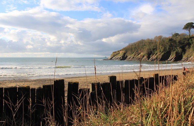 Turreted gatehouse to the historic Caerhays Castle located on the beach on the south Cornish Coast