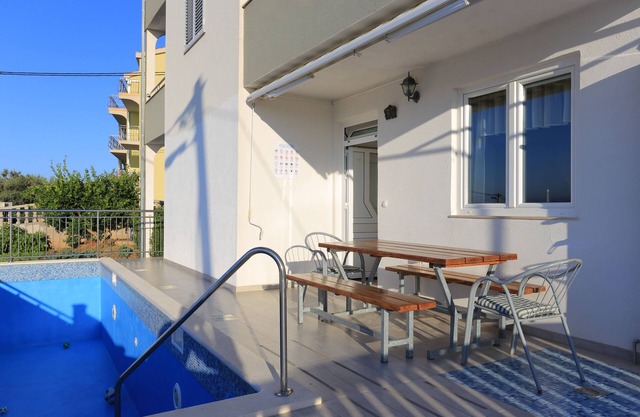 Two bedroom apartment with terrace and sea view Mali Rat, Omiš (A-9698-a)