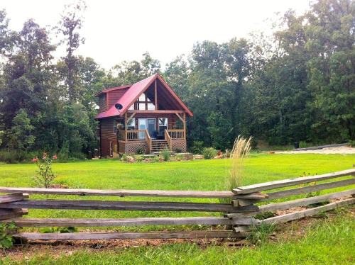Two-Story Log Cabin Rental with a Hot Tub near Upper Meramec River, Missouri