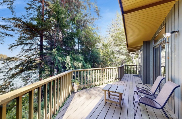 Unique lakefront cabin near the dunes with a private dock & fireplace