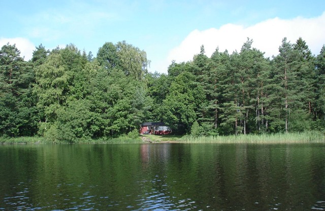 Vacation home directly on Lake Loka with its own boat